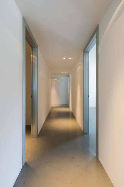 istock Trick of light in white corridor 813766012
