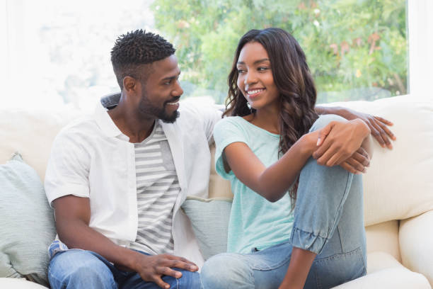 istock Happy couple on the couch 813766566