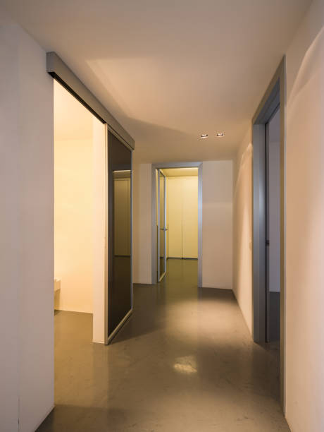 istock Trick of light in white corridor 813766684