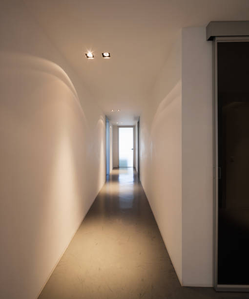 istock Trick of light in white corridor 813774770