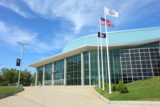 Manchester, New Hampshire, USA - July 8, 2017: Daytime view of the front entrance to the Southern New Hampshire University Arena located on Elm Street (U.S. Route 3) at the corner of Lake and Granite streets