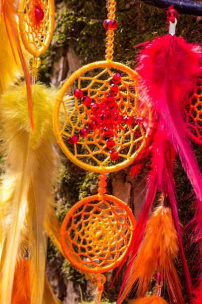 istock Dreamcatcher made of feathers, leather, beads, and ropes 813783322