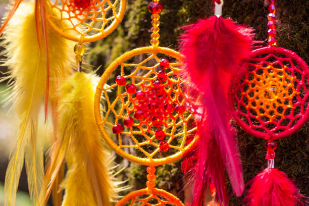 istock Dreamcatcher made of feathers, leather, beads, and ropes 813784688