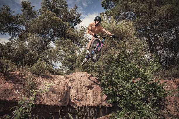 istock Mountain bike jump 813785812