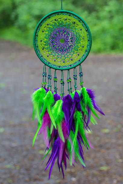 istock Dreamcatcher made of feathers, leather, beads, and ropes 813785884