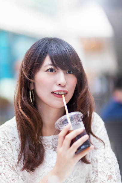 istock Young Women Enjoying Iced Coffee 813786208