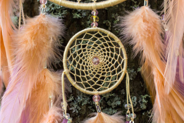 istock Dreamcatcher made of feathers, leather, beads, and ropes 813786468