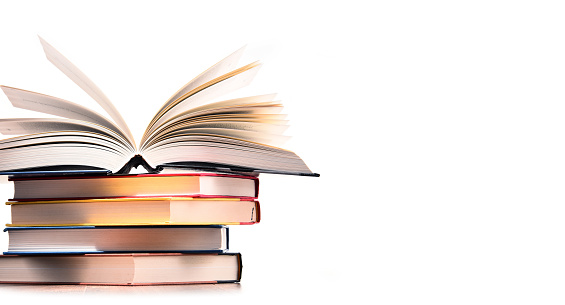 Composition with stack of books isolated on white.