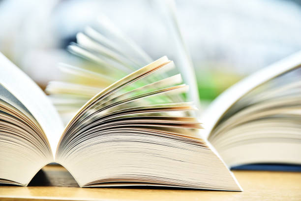 istock Books lying on the table in the public library 813799438