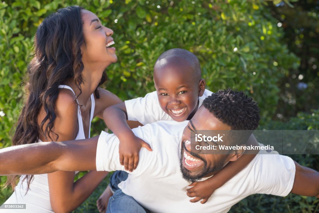 Happy family spending time together Happy family spending time together in the garden at home Family Stock Photo