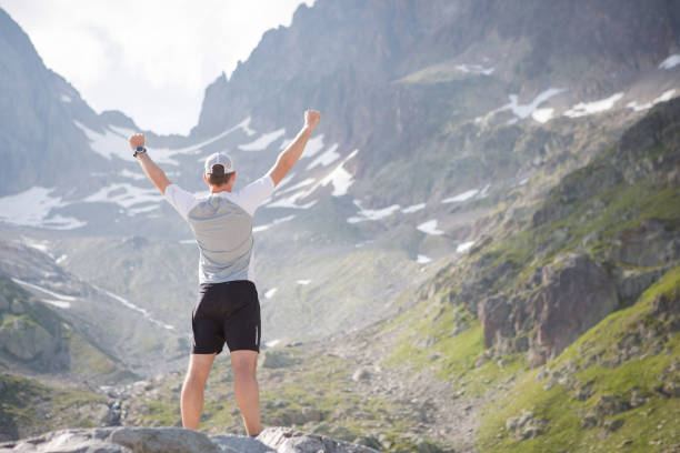 istock Successful male stands and admires the view 813803848