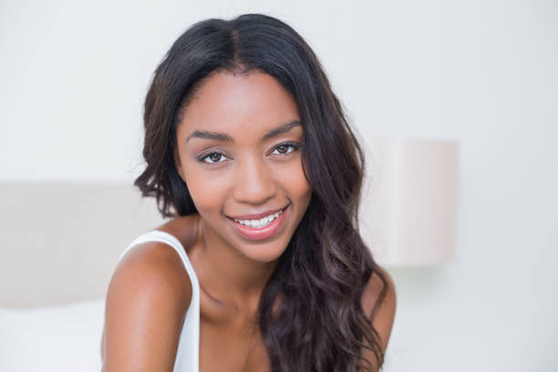 istock Beautiful woman smiling at camera 813812400