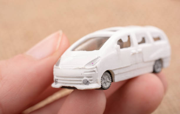istock Toy car as a transportation devices in hand 813821732