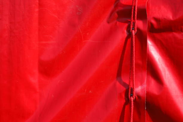 istock red tarpaulin with red band 813823366