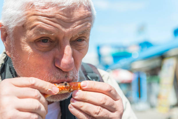 istock Men eating crab leg 813823460