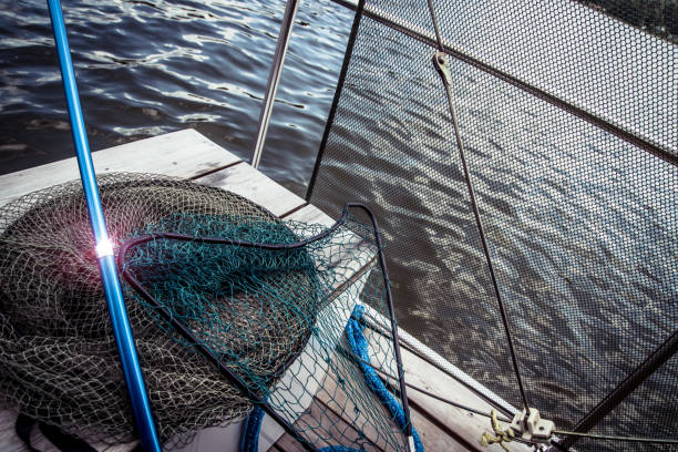 istock Fishing net on houseboat 813823542