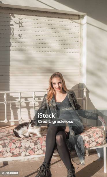 Beautiful Woman Sitting With Kitten Stock Photo - Download Image Now - 20-29 Years, 25-29 Years, Adult