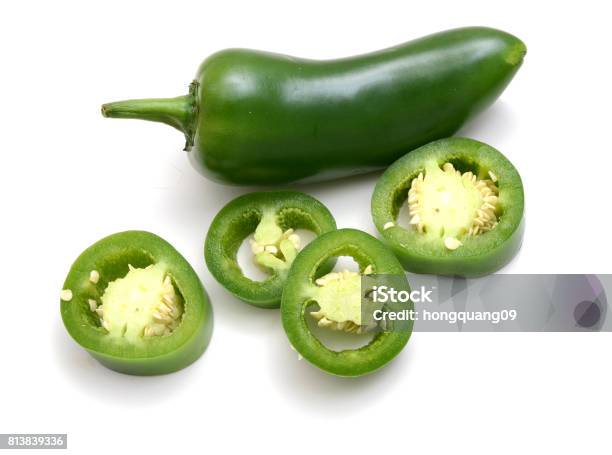 Finely Chopped Chili Pepper On A White Background Stock Photo - Download Image Now - Jalapeno Pepper, Slice of Food, Chopped Food