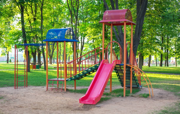 istock Colorful playground on yard in the park. 813840060