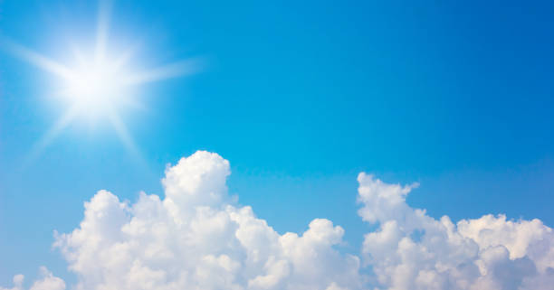 istock clouds and sun in the blue sky background 813864668