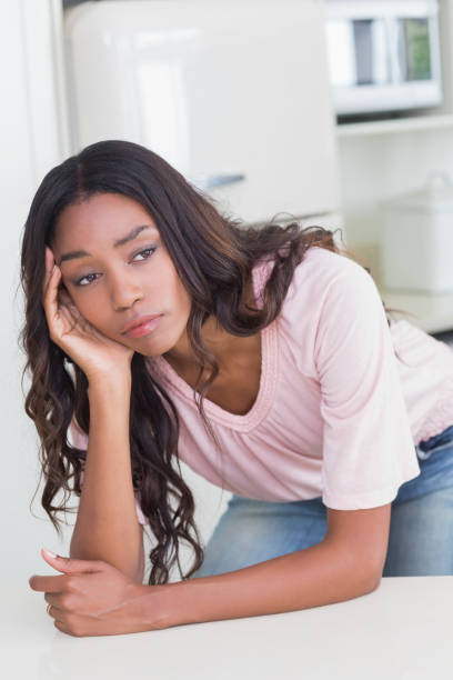 istock Sad woman thinking at the counter 813889116
