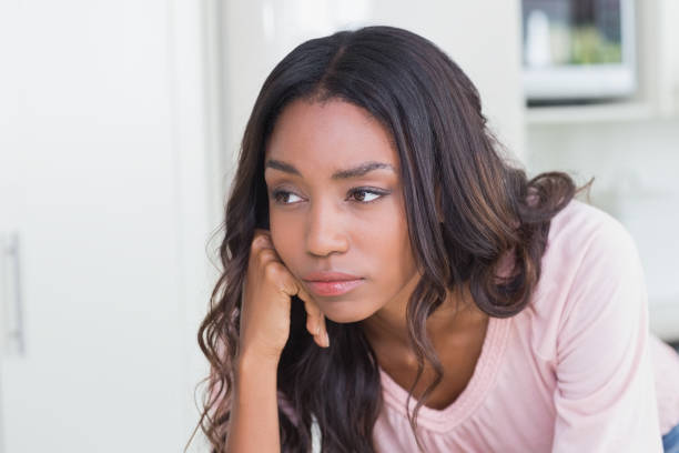 istock Sad woman thinking at the counter 813889148