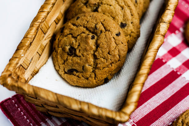 istock Peanut butter cookies with chocolate chips in a basket 813898760