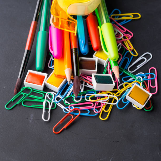 istock Colorful stationery back to school concept on dark 813919206