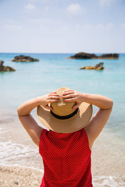 istock Young woman on the beach 813930524
