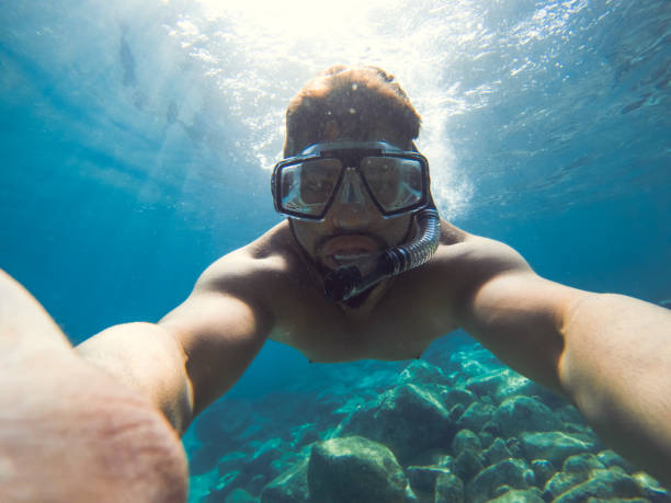 istock Young swimmer in open sea... 813935876