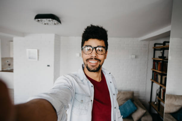istock Young african man is taking selfie 813939958