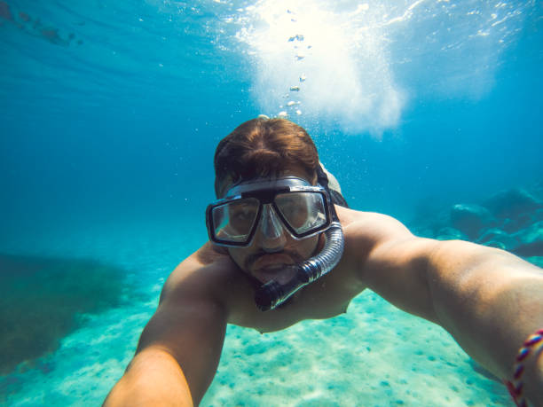 istock Young swimmer in open sea... 813939996