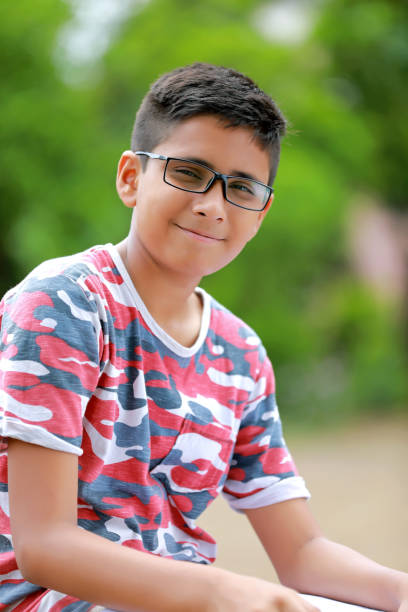 istock indian child on eyeglass 813940264
