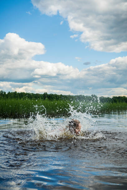 istock Girl in the lake 813962966