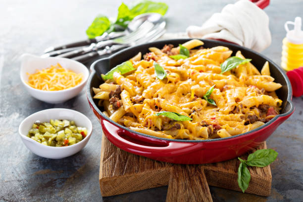 istock Cheesy pasta bake with ground beef and herbs 813967732