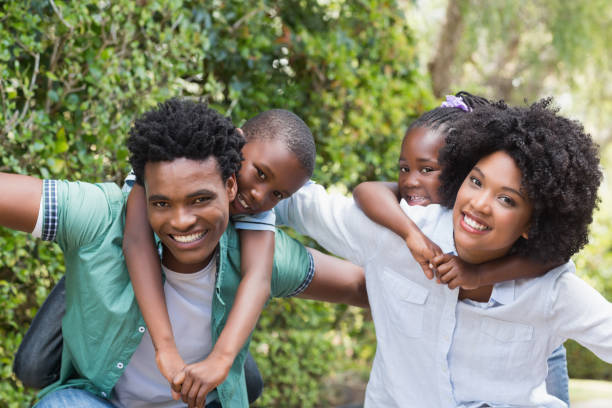 istock Happy family having fun together 813967756