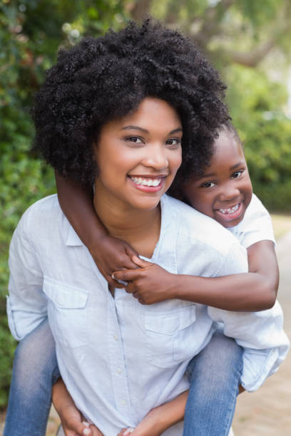 istock Happy mother and daughter having fun together 813967820