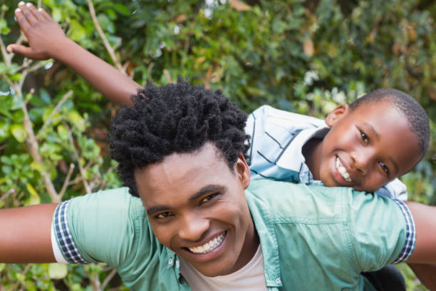 istock Happy father and son having fun together 813967874