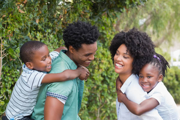 istock Happy family having fun together 813968024