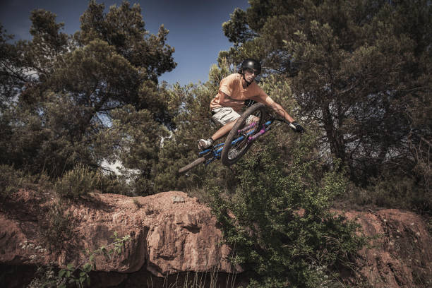 istock Bmx rider outdoors Real jump 813973052