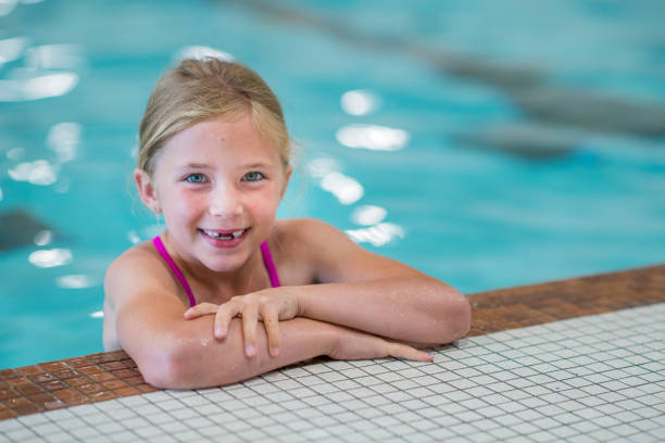 istock Happy Girl Swimmer 813974326