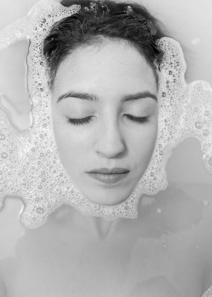 istock girl in the shower. 813981030