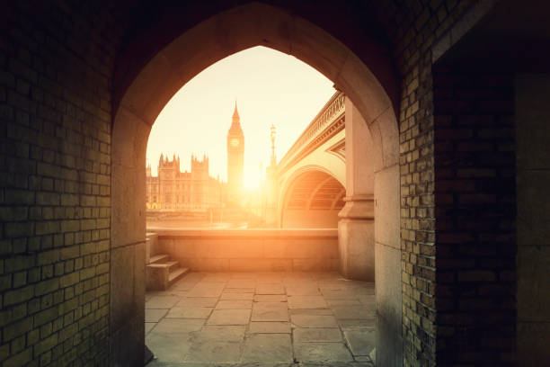View of Big Ben through the pointed arch at sunset