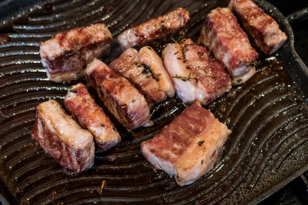 istock Lamb Meat is frying in a pan. 814000434