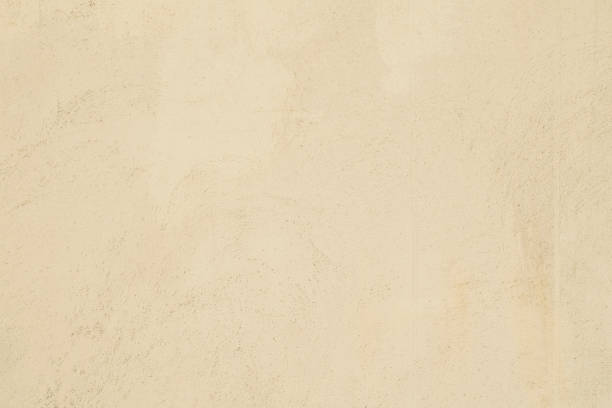 istock Texture of the plastered wall is yellow in high resolution 814010312