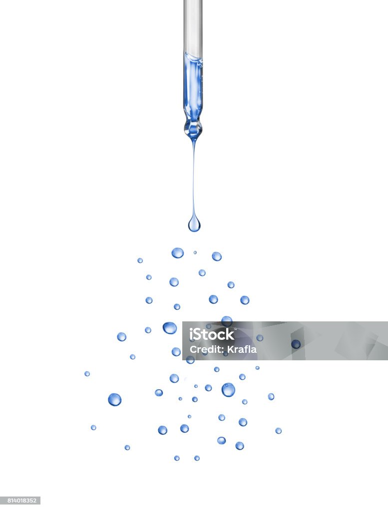 Close-up of dropper with falling drops on white background Pipette Stock Photo