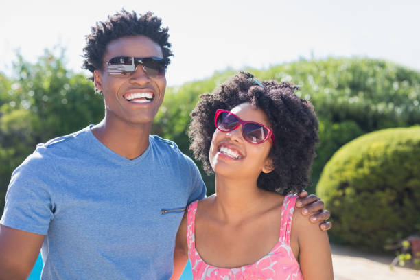 istock Happy couple smiling at camera 814036264