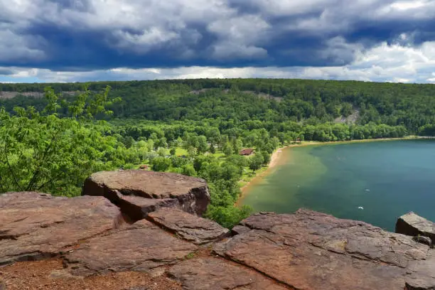 Areal view on South shore beach from rocky ice age hiking trail. Summer landscape in Devils Lake State Park, Baraboo area, Wisconsin, USA. Nature background. Nature of Midwest, Wisconsin.