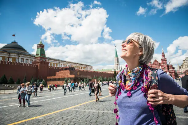 Photo of Portrait of a Beautiful Mature Woman Enjoying the  Red Square in Moscow, Russia