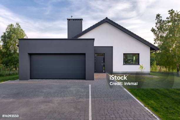 Cozy House With Garage Stock Photo - Download Image Now - House, Garage, Driveway